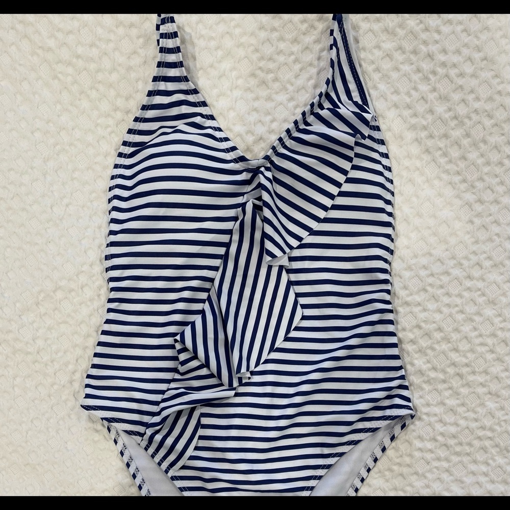 NWOT Navy/White One piece swimsuit with ruffle in front and adjustable back